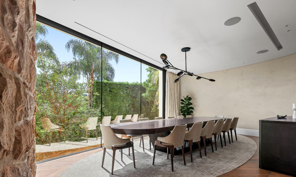 Overhead AV and HVAC systems in modern dining area, Denote